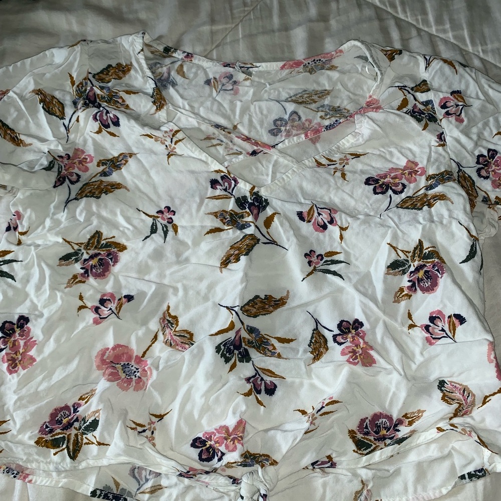 white, kinda cropped, floral shirt